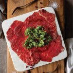 Beef Carpaccio with Pomegranate and Arugula