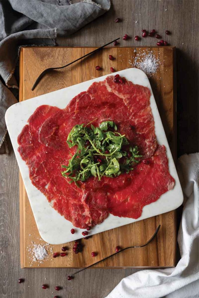 Beef Carpaccio with Pomegranate and Arugula