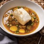 Halibut in Broth with Spring Leek, Fingerling Potatoes, and Peas