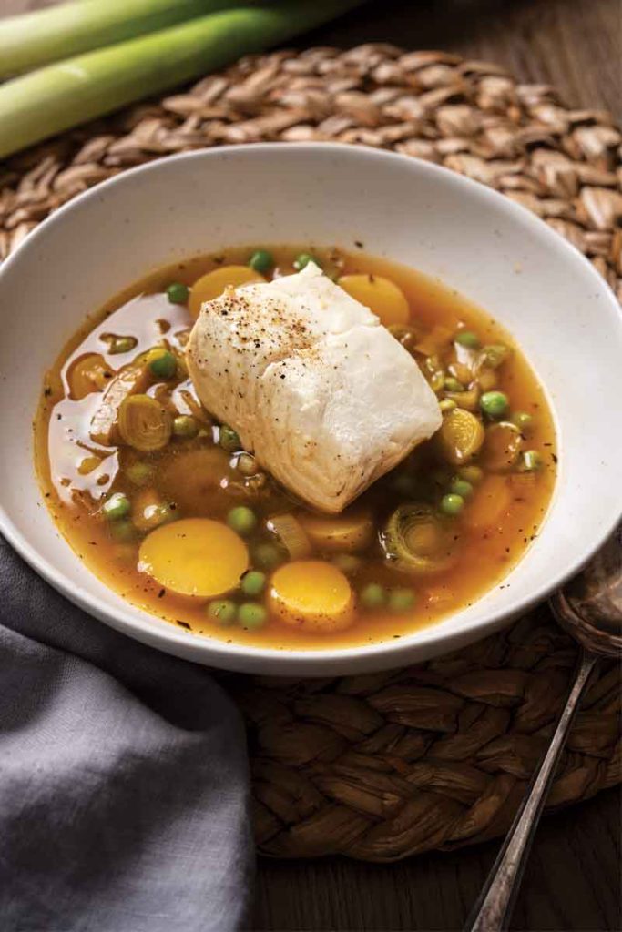 Halibut in Broth with Spring Leek, Fingerling Potatoes, and Peas